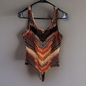 Guess one piece bodysuit with snaps at the bottom